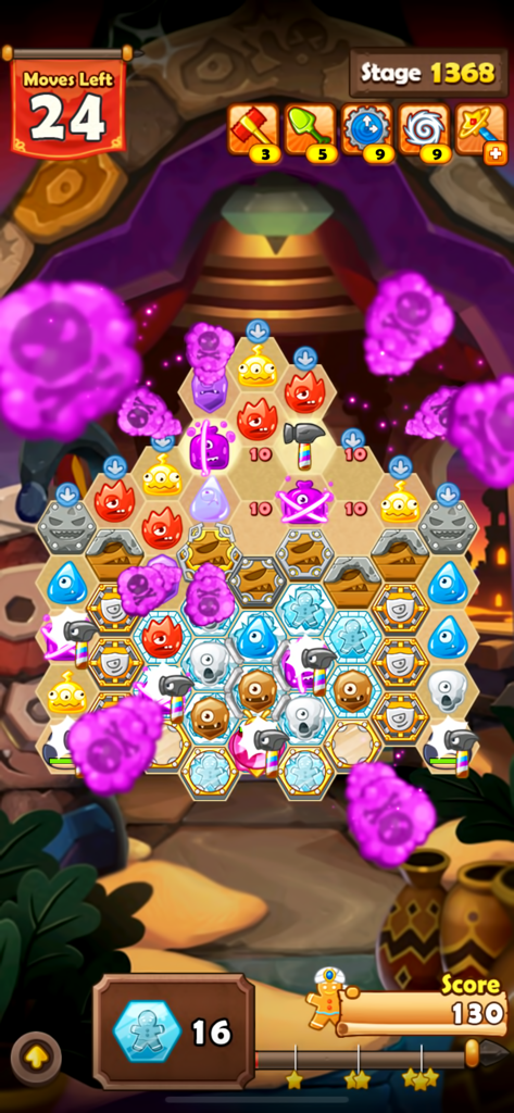 Monster Busters: Hexa Blast - A hexagonal match 3 puzzle level in Monster Busters Hexa Blast featuring colorful monsters and gingerbread saving goals
