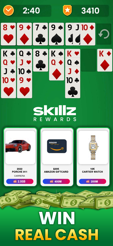 Solitaire Crash - Win Cash - Pantalla del juego de solitario mostrando cartas y premios de lujo como un Porsche y un reloj Cartier bajo el texto Gana Dinero Real