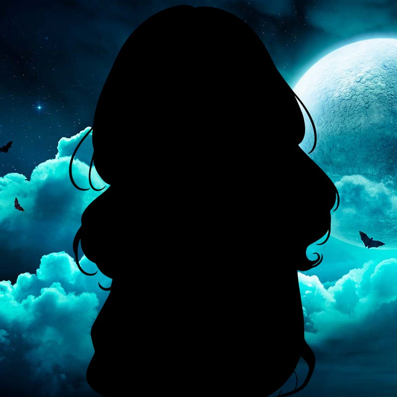 shy pretty girl wearing a sweater that is falling off one shoulder portrait