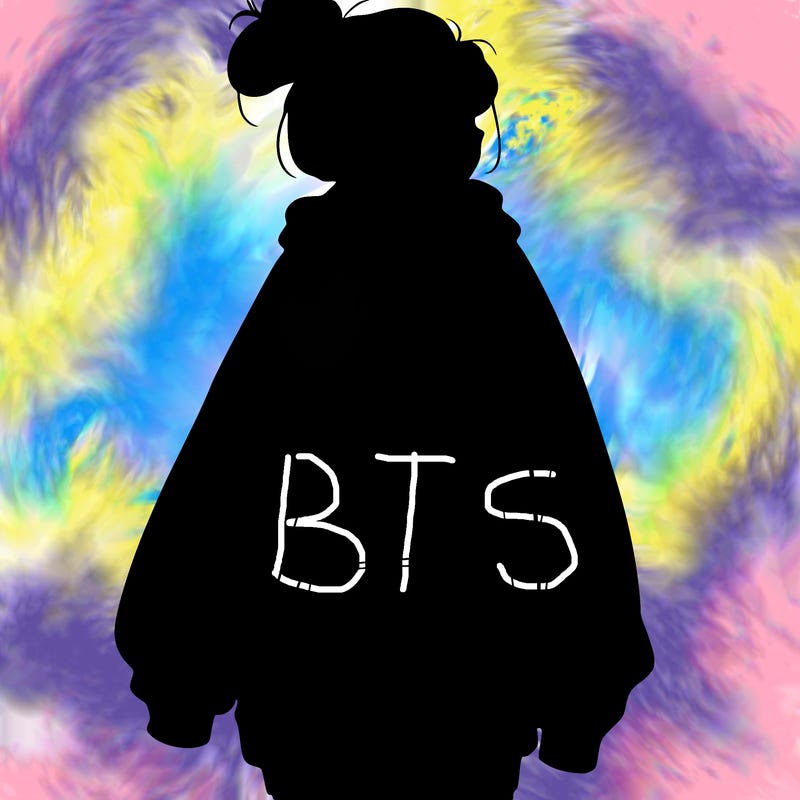 realistic girl with a oversized sweatshirt on and a bun