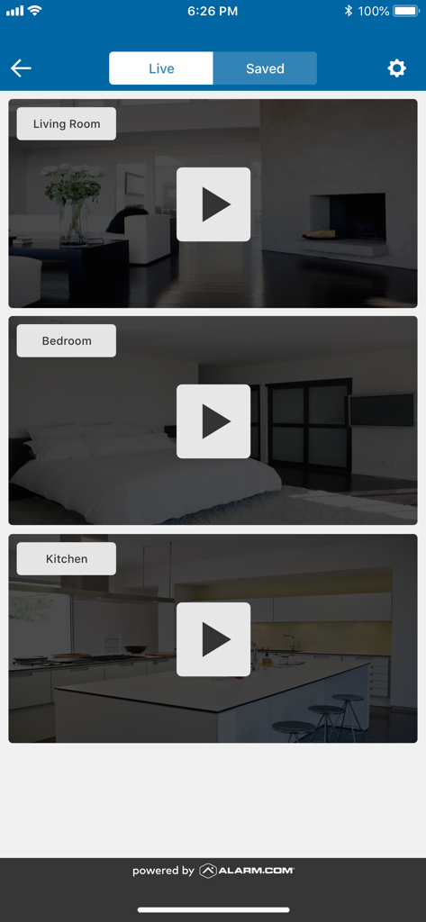 Interface of the Best Buy Assured Living app showing live video feeds for the living room bedroom and kitchen