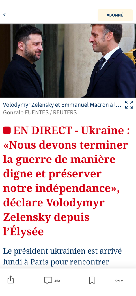 Artigo do aplicativo Le Figaro com Volodymyr Zelensky e Emmanuel Macron no Eliseu