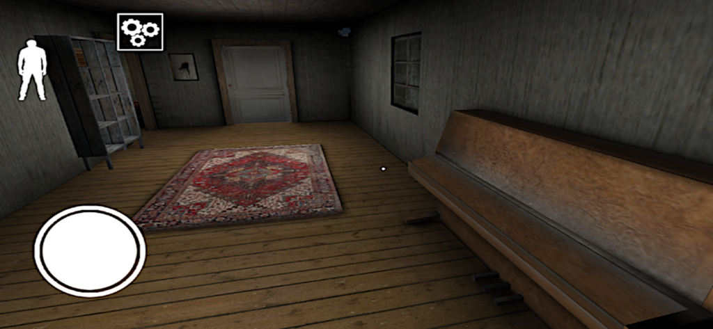 Granny: Chapter Two - A first person view of a dimly lit room with a piano and a patterned rug in Granny Chapter Two.