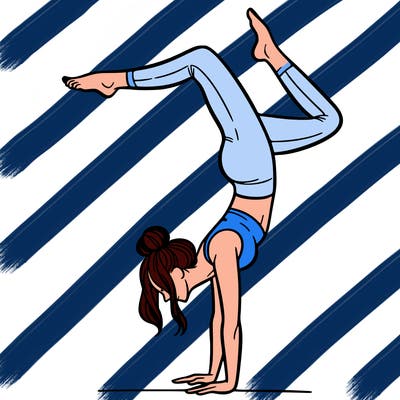 a woman doing a handstand