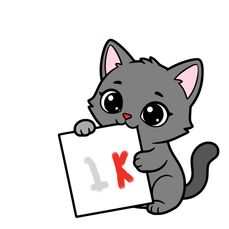 a small cat with a blank sheet of paper in its hand. the cat is sooooooo cute!