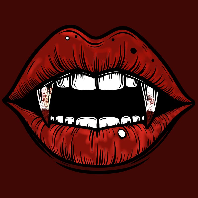 lips with vampire teeth