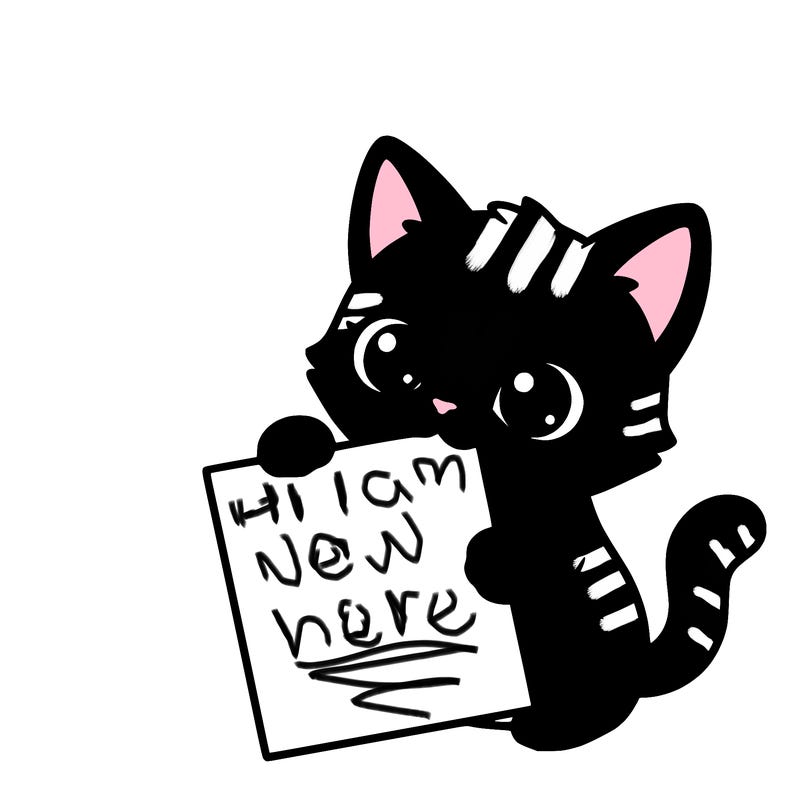 a small cat with a blank sheet of paper in its hand. the cat is sooooooo cute!