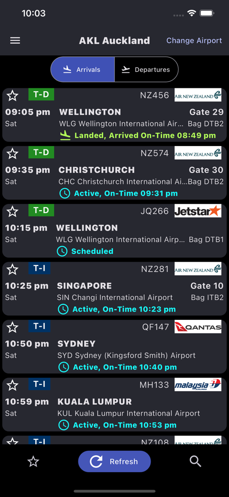 Auckland Airport AKL - Auckland Airport flight arrivals screen showing status gate and baggage info for various flights