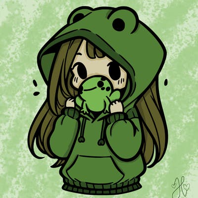 a girl holding a froggy hoodie