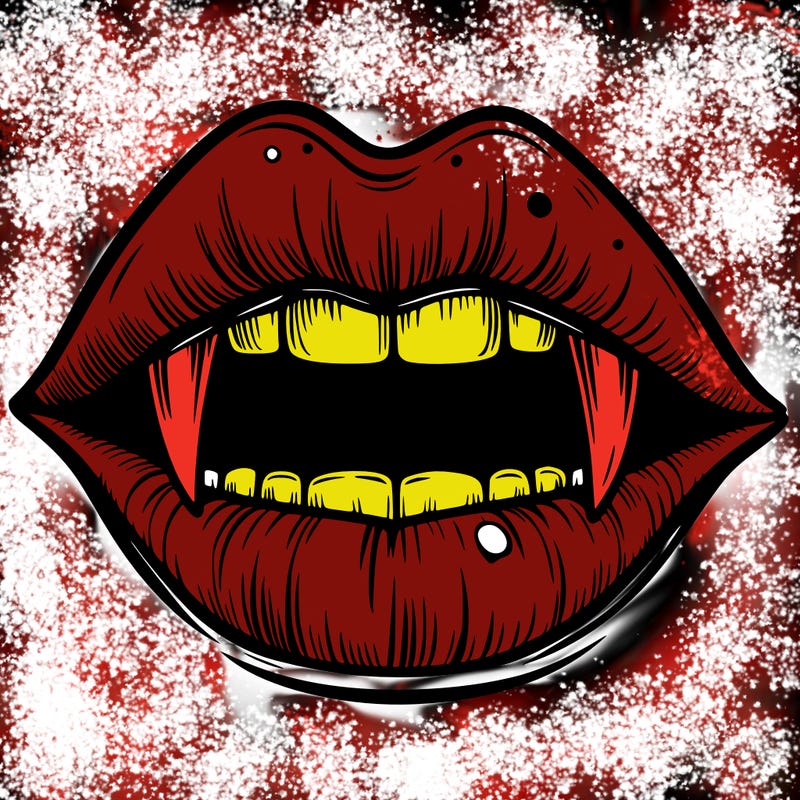 lips with vampire teeth