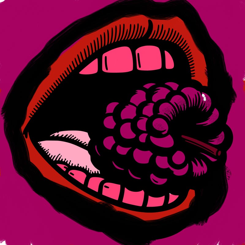 mouth with a razzberry in the mouth