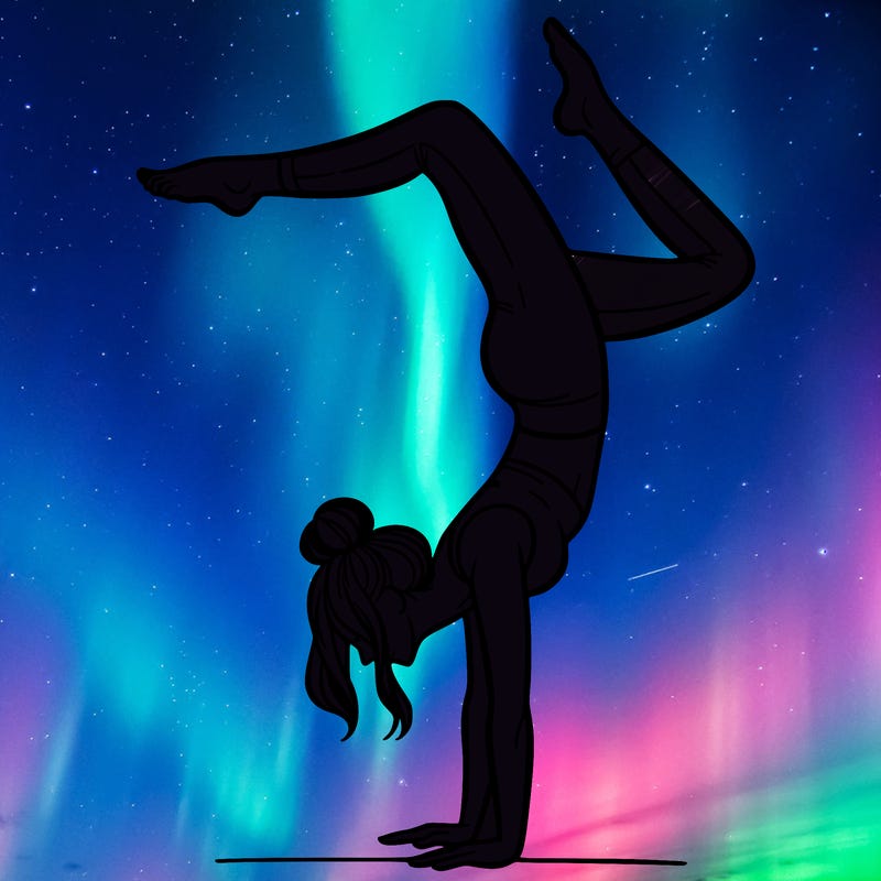 a woman doing a handstand