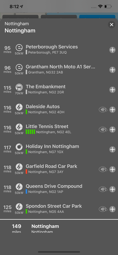 WattsUp app interface showing a list of nearby EV charging stations with distance power and real-time status details
