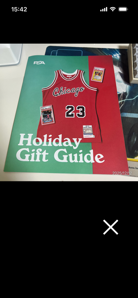 ClipOCR2 - A mobile app screenshot showing the process of scanning a holiday gift guide magazine cover with a basketball jersey for text recognition