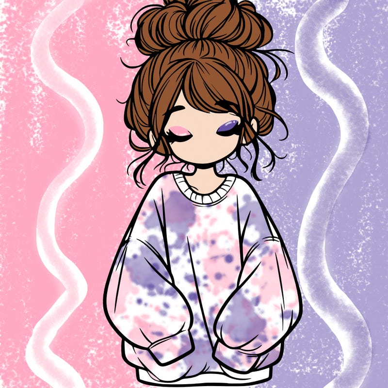 girl with baggy sweatshirt and messy bun
