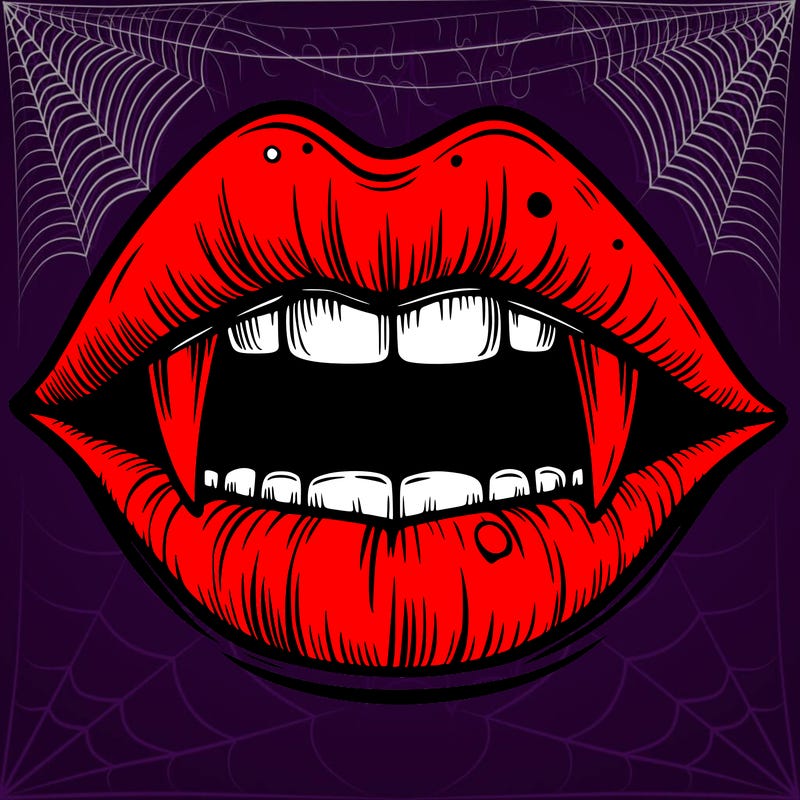 lips with vampire teeth