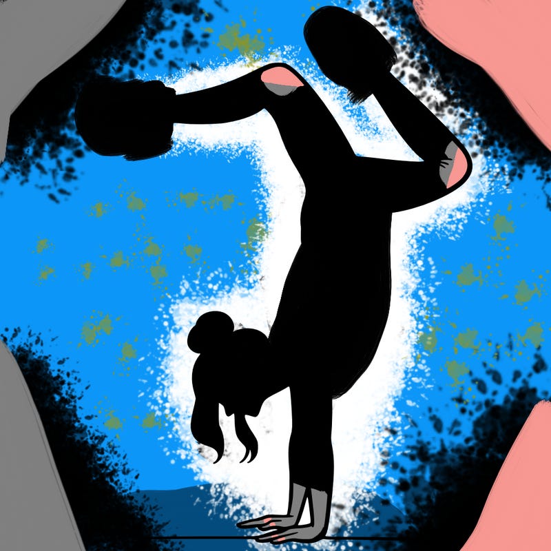 a woman doing a handstand