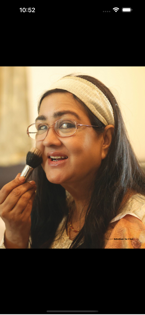 Star & Style - A woman applying makeup in a Star and Style magazine lifestyle feature.