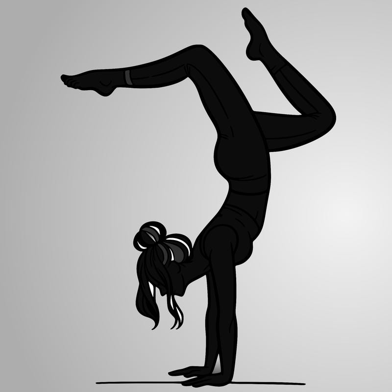 a woman doing a handstand