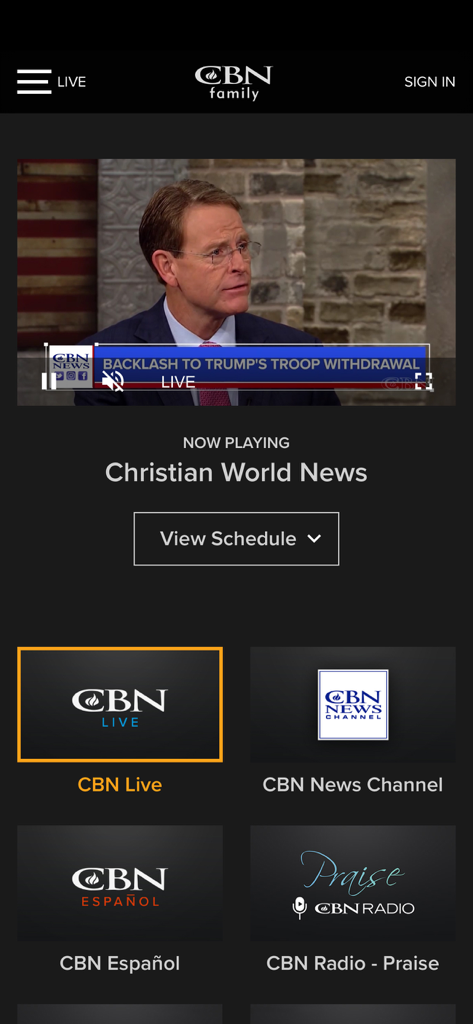 CBN Family - Videos and News - Screenshot of the CBN Family app showing a live news broadcast and options for various Christian channels including CBN Live and CBN Español.