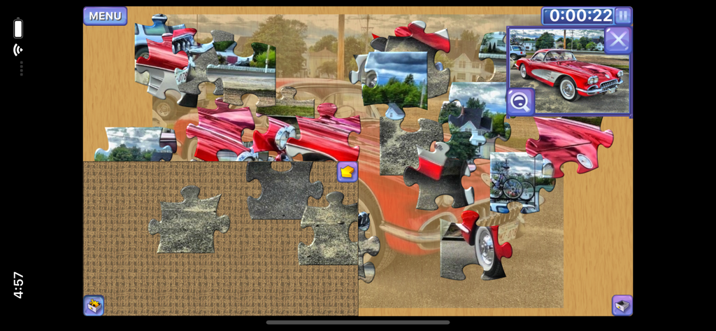 Digital jigsaw puzzle of a classic red car being assembled in the Everyday Jigsaw app interface.