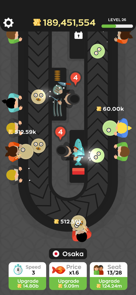 Top down view of a sushi bar conveyor belt with chefs and customers