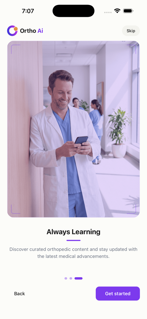 Ortho AI - AIMD - Male doctor using the Ortho AI app in a hospital setting