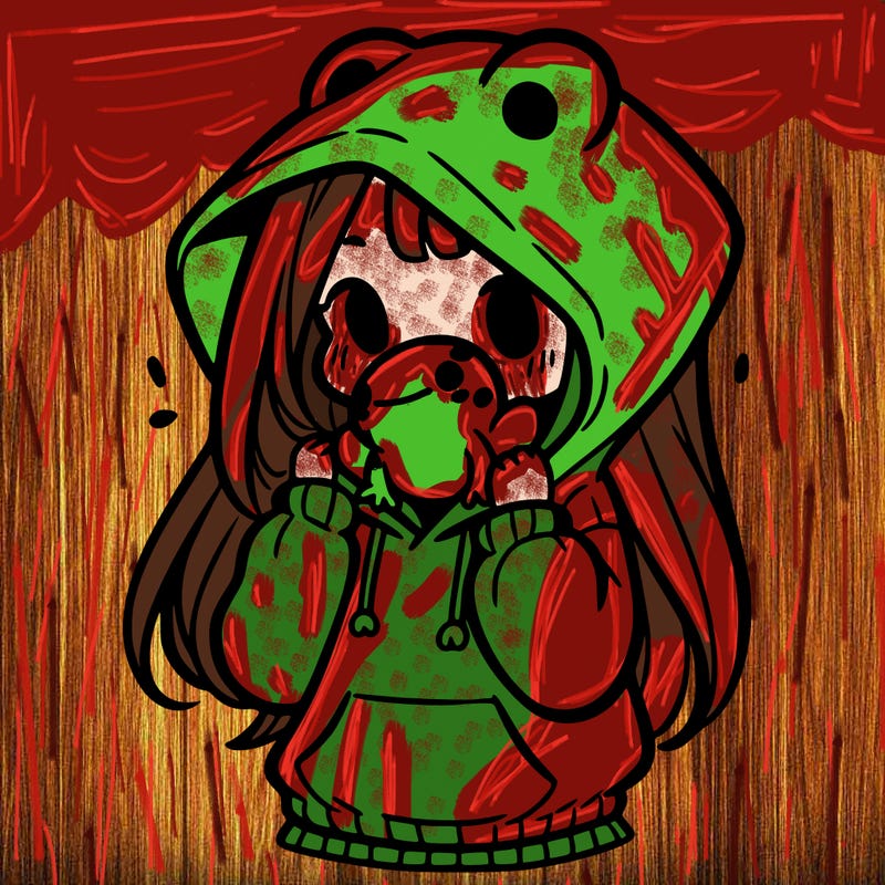 a girl holding a froggy hoodie