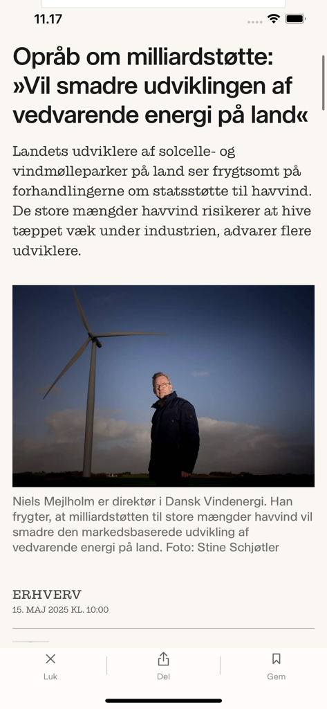 Finans - Danmarks erhvervsavis - Screenshot di un articolo di notizie economiche sui sussidi per l'energia rinnovabile nell'app Finans.