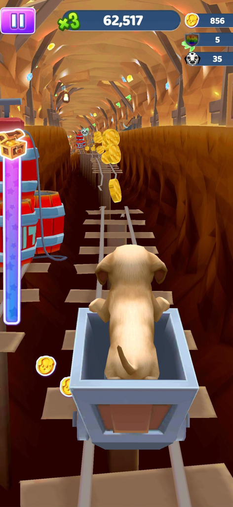 A puppy riding a minecart through a cave tunnel while collecting gold coins in Pet Run.