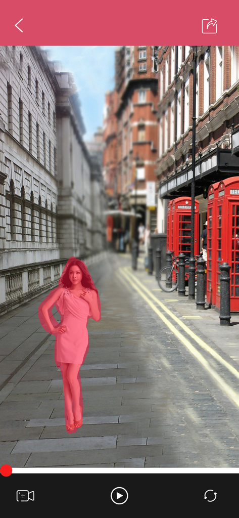 Selecting a woman in a pink dress for object removal on a street in London using the Video Retouch app