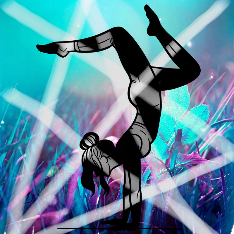 a woman doing a handstand