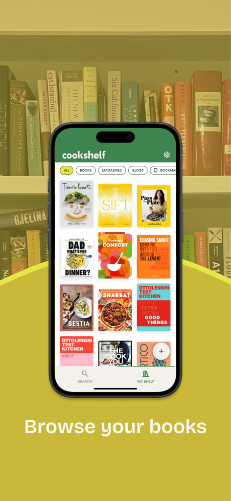 CookShelf: Search Cookbooks - Teléfono inteligente que muestra la pantalla de navegación de la aplicación CookShelf con una cuadrícula de portadas de libros de cocina digitales