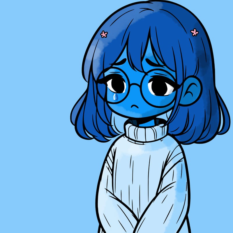 sad girl with glasses in a sweater