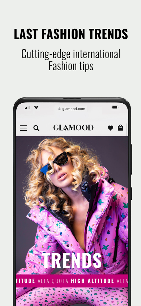Glamood - Glamood mobile app screen showing international fashion trends and a model in a luxury purple puffer jacket