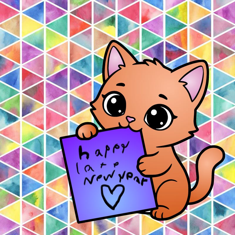 a small cat with a blank sheet of paper in its hand. the cat is sooooooo cute!