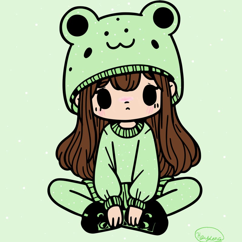 a girl wearing a frog hat and some frog socks