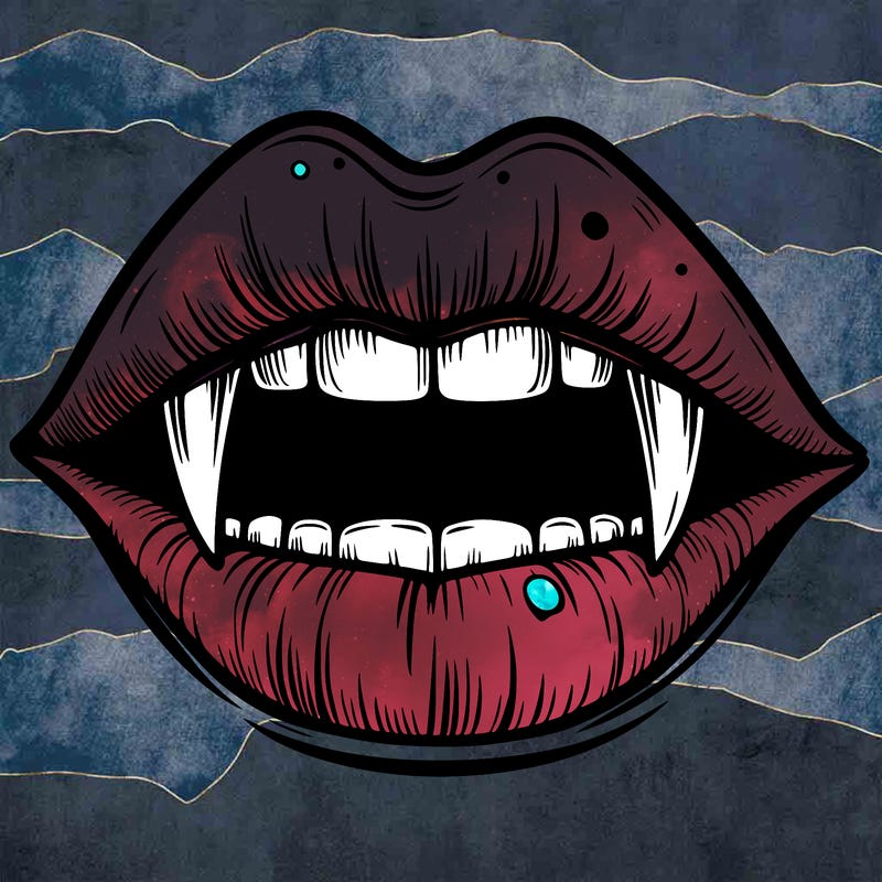 lips with vampire teeth
