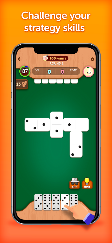 Mobile screen of Domino Champions showing a classic match on a green board with the headline challenge your strategy skills
