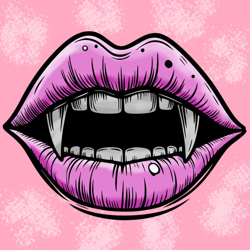 lips with vampire teeth