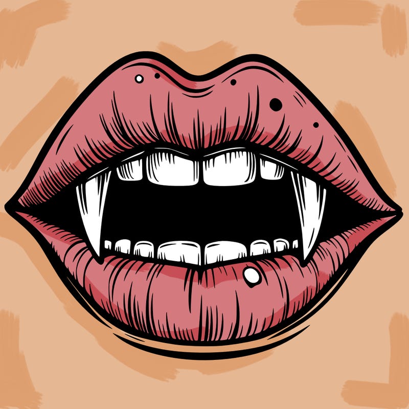 lips with vampire teeth