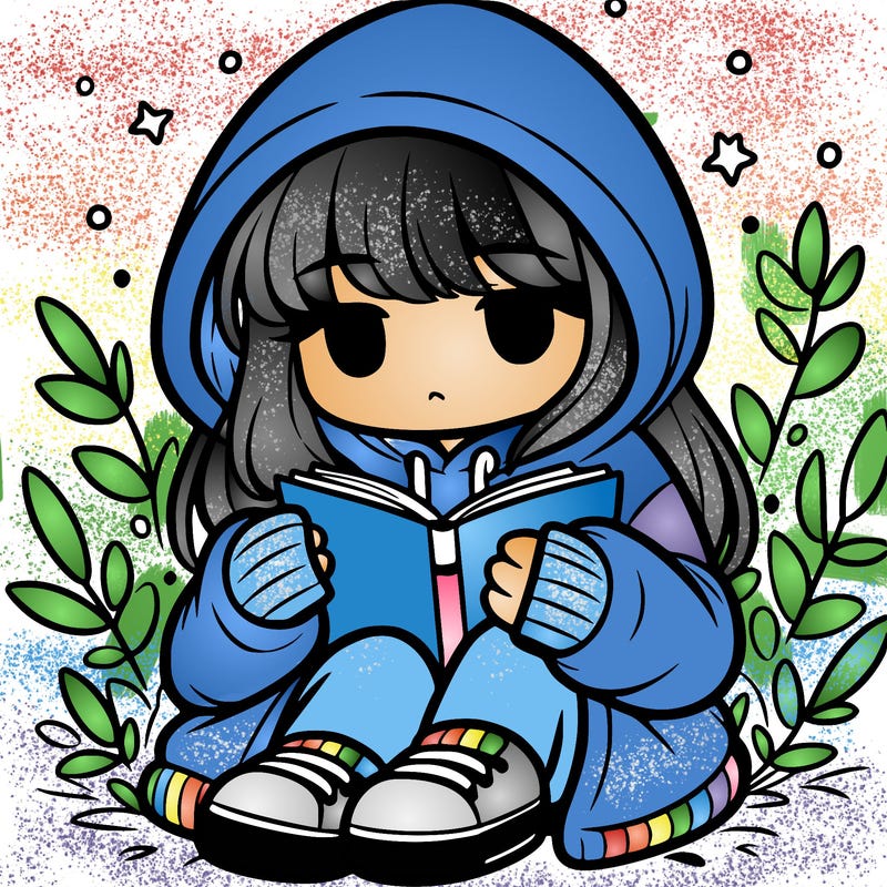girl in oversized hoodie reading a book