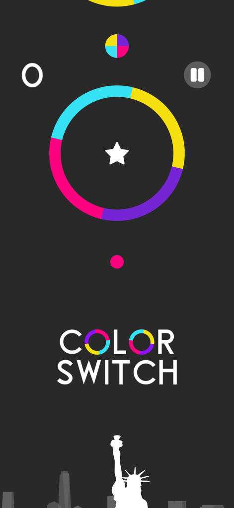 Gameplay of Color Switch showing a rotating multi colored ring obstacle and a pink player ball on a dark background