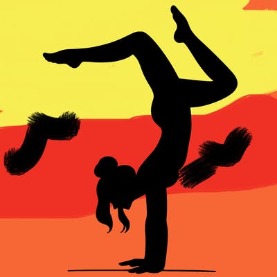 a woman doing a handstand