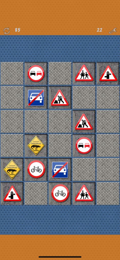 Pairs (Oh no! Another one!) - A memory matching game board showing various road signs such as no overtaking and danger crocodile warnings.