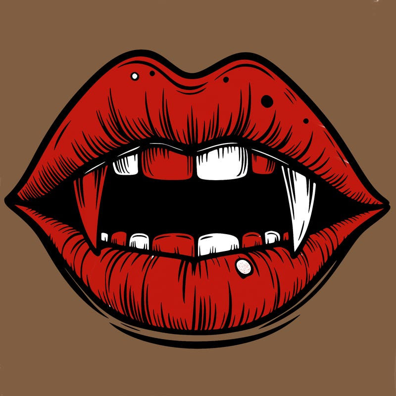 lips with vampire teeth