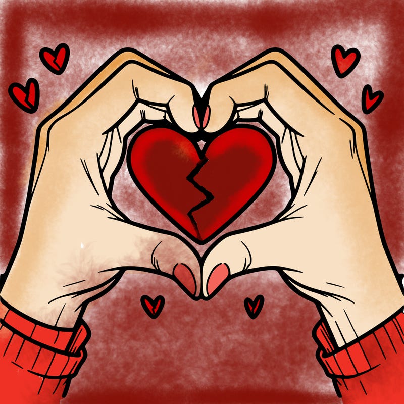 two hands making a heart