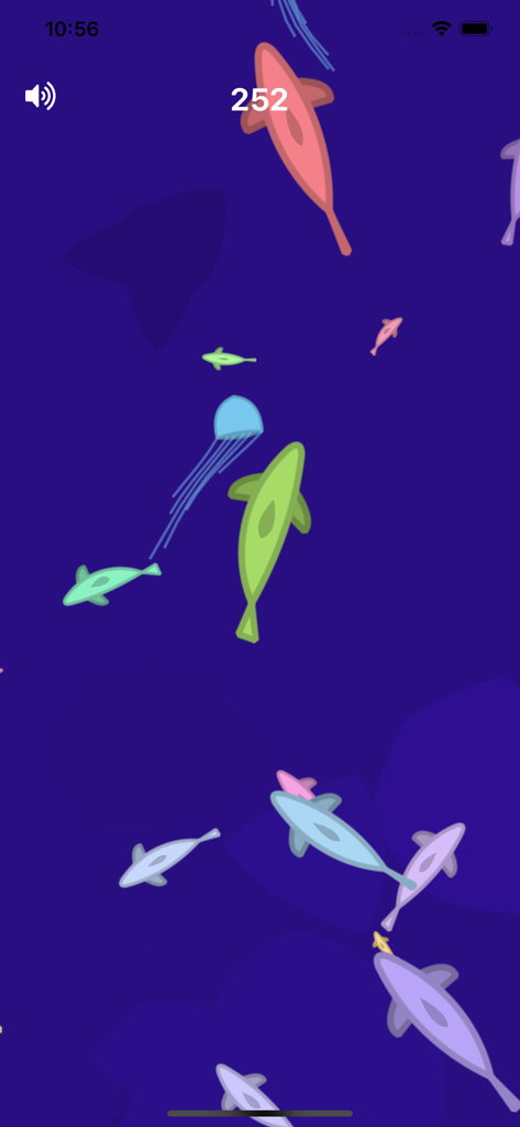 Vista di gameplay dall'alto che mostra pesci colorati e una medusa blu che nuotano in acqua blu profonda