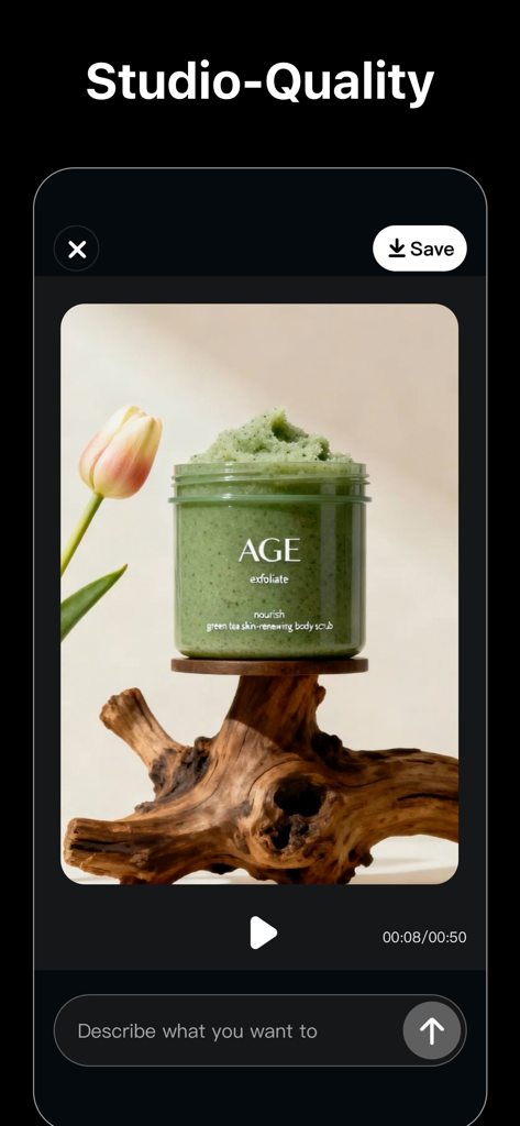 VEアプリのインターフェース。流木の上にボディスクラブのスタジオ品質の商品動画が表示されており、下部にはAIプロンプトバーがあります。