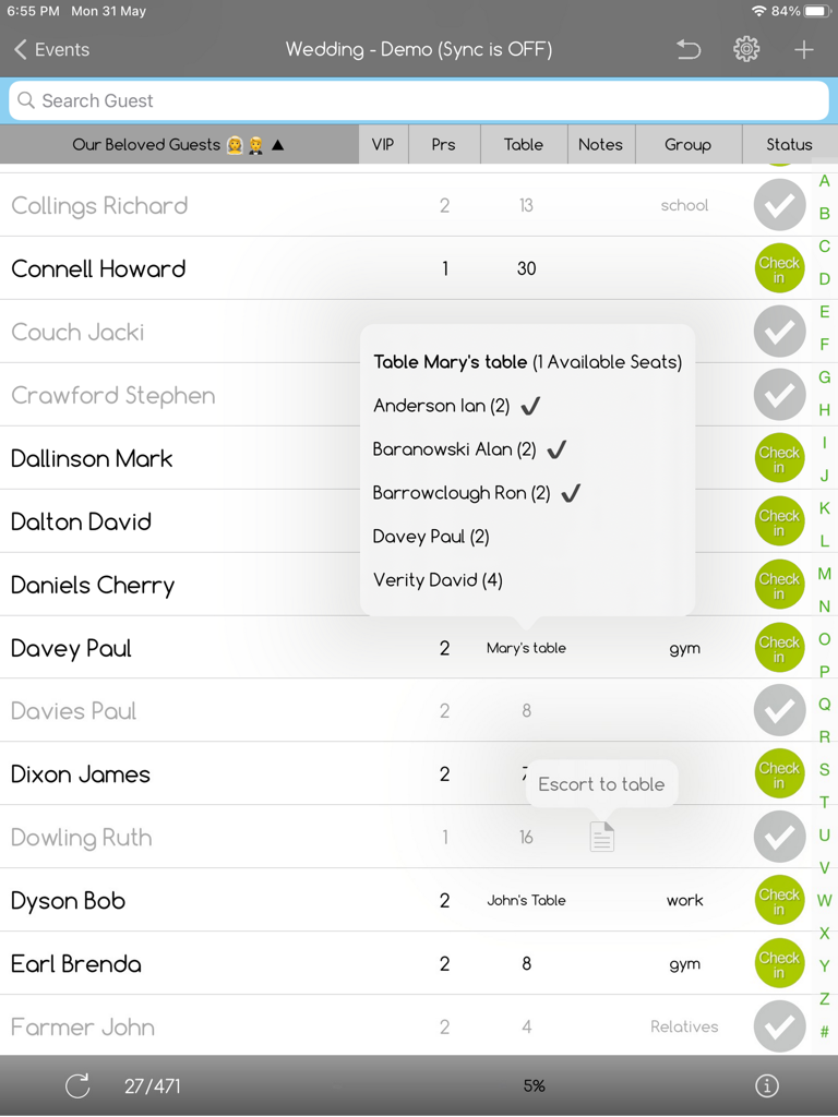 iPad screen showing guest check in list and table seating details in e-GuestList app